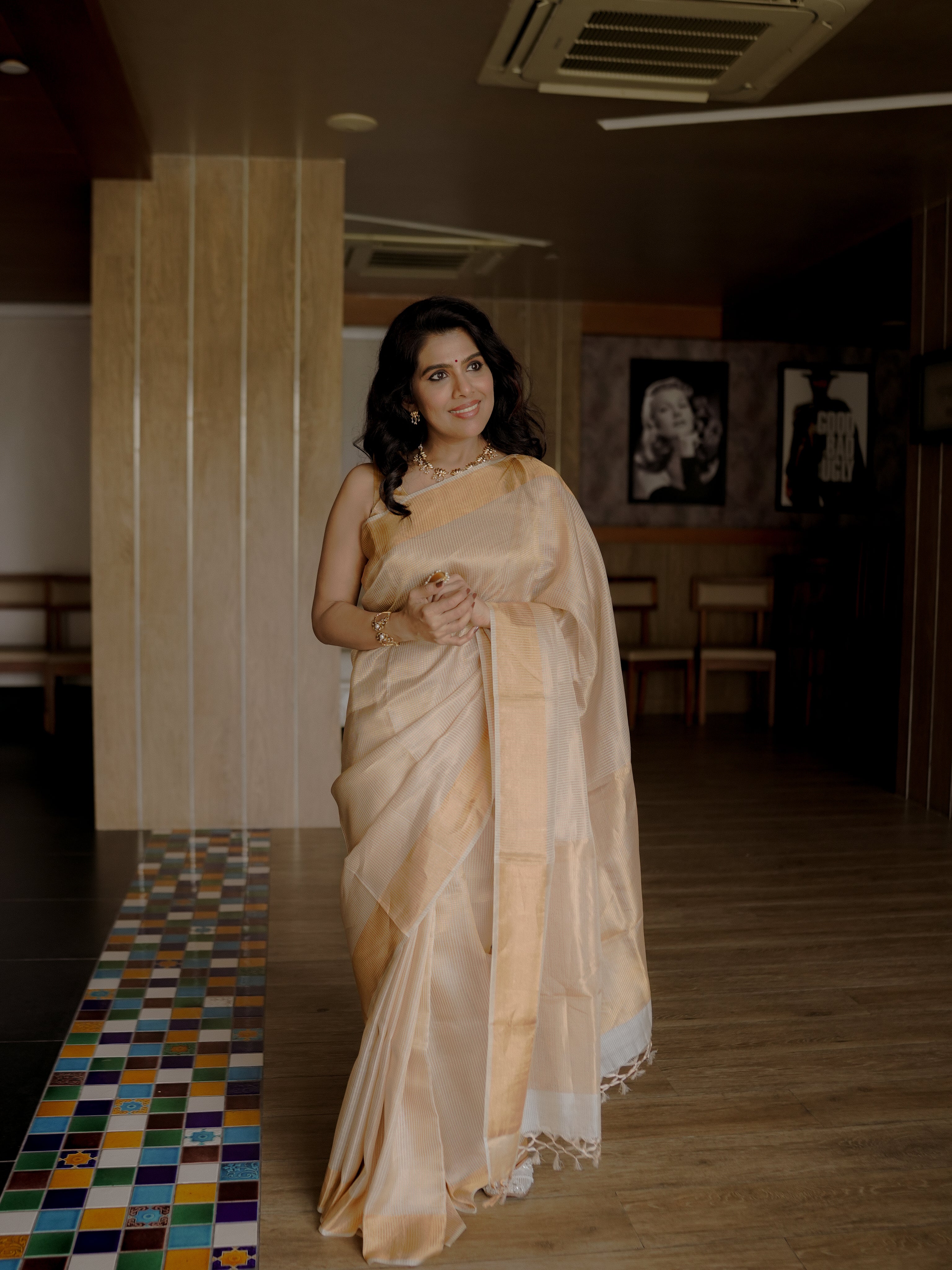 Classic cream and gold saree