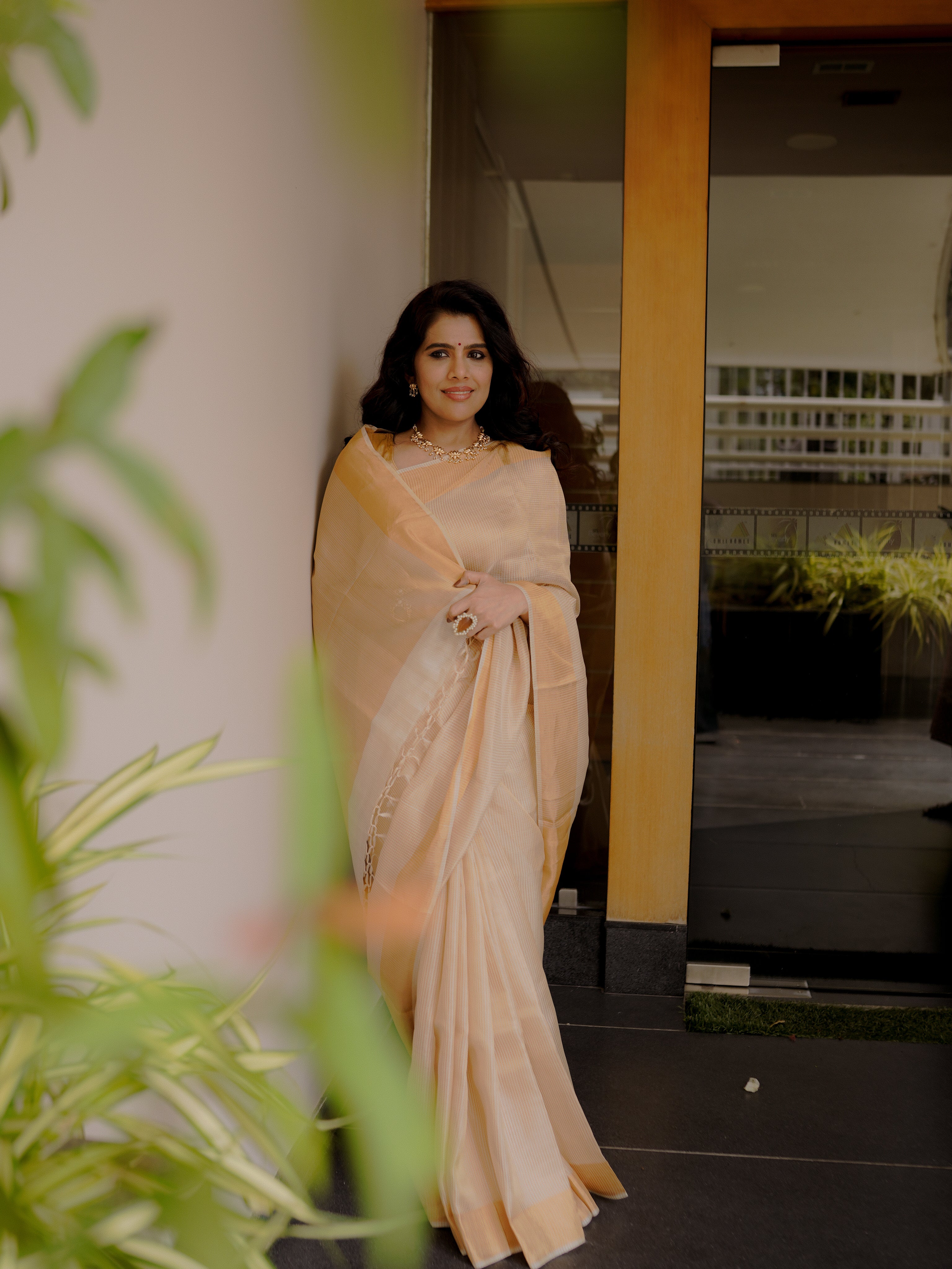 Classic cream and gold saree