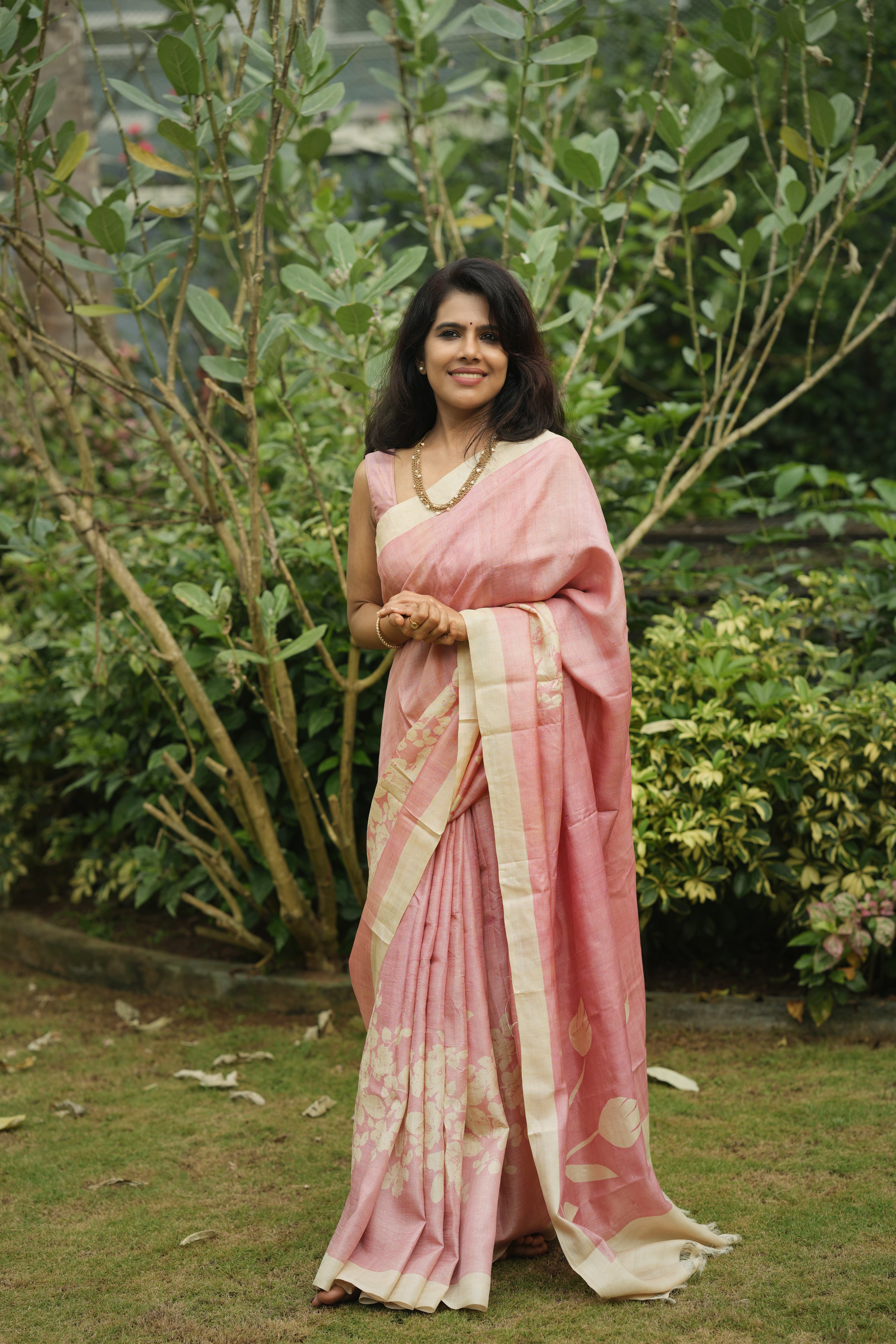 Pink floral tussar silk saree.