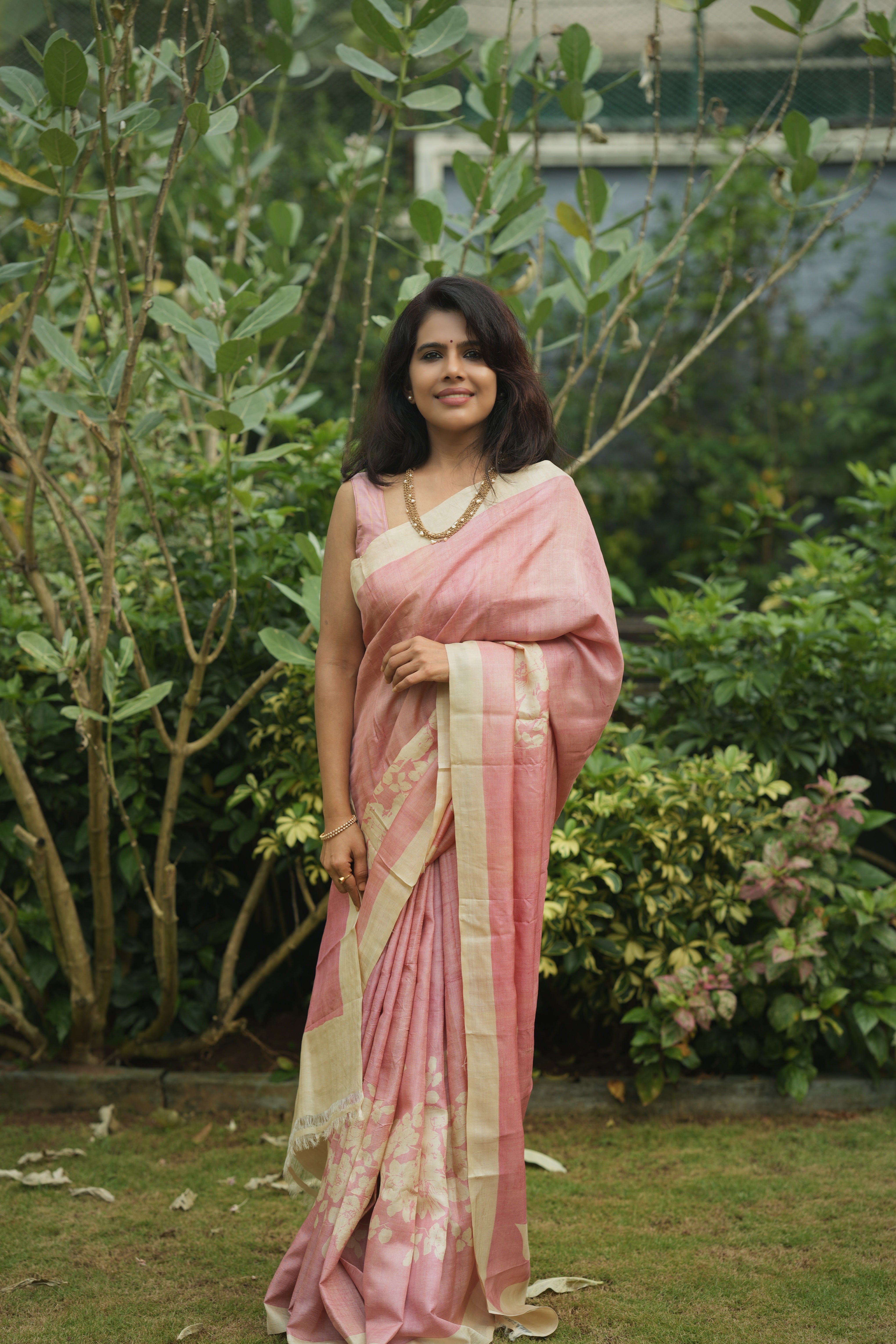 Pink floral tussar silk saree.