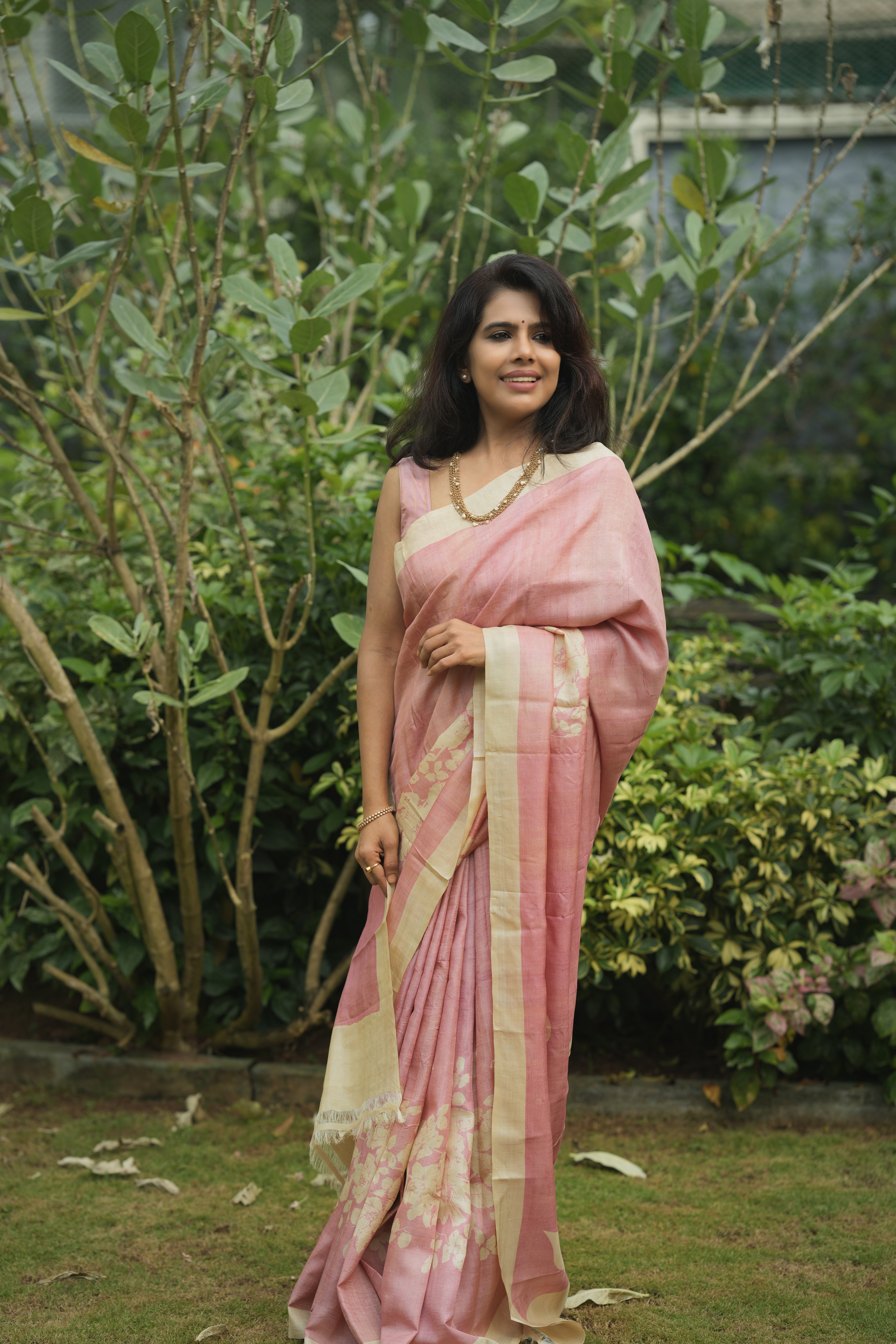 Pink floral tussar silk saree.