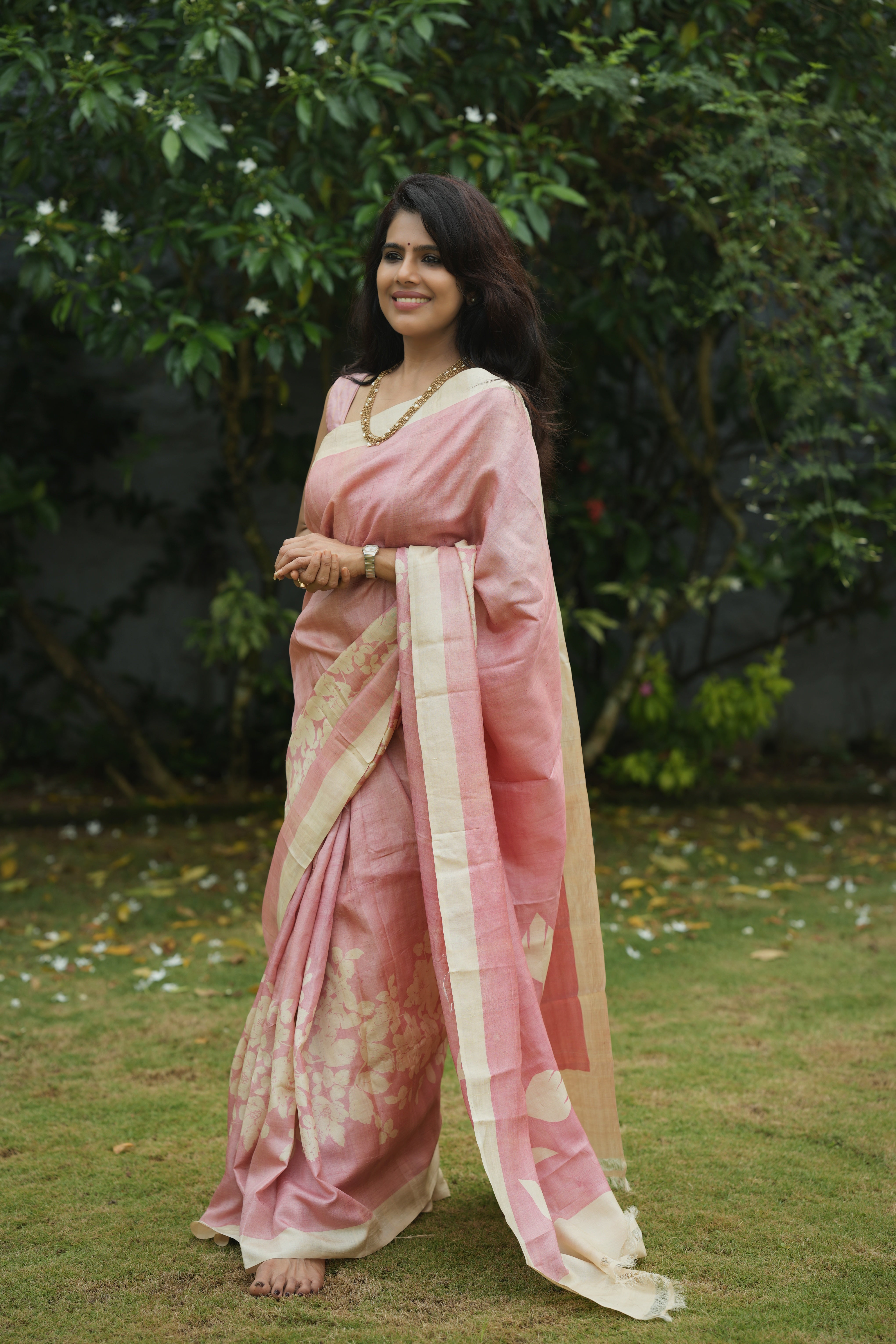 Pink floral tussar silk saree.