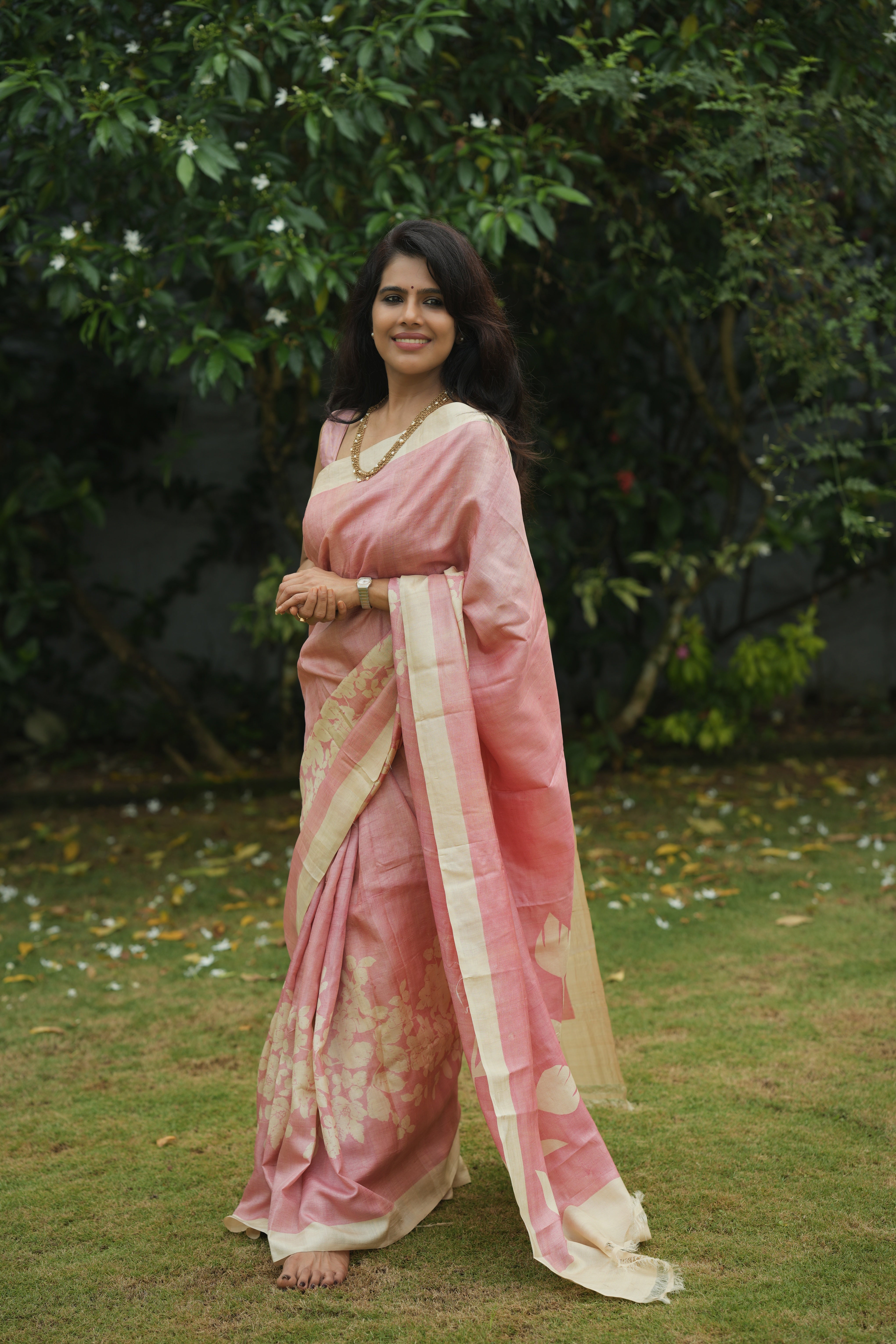 Pink floral tussar silk saree.