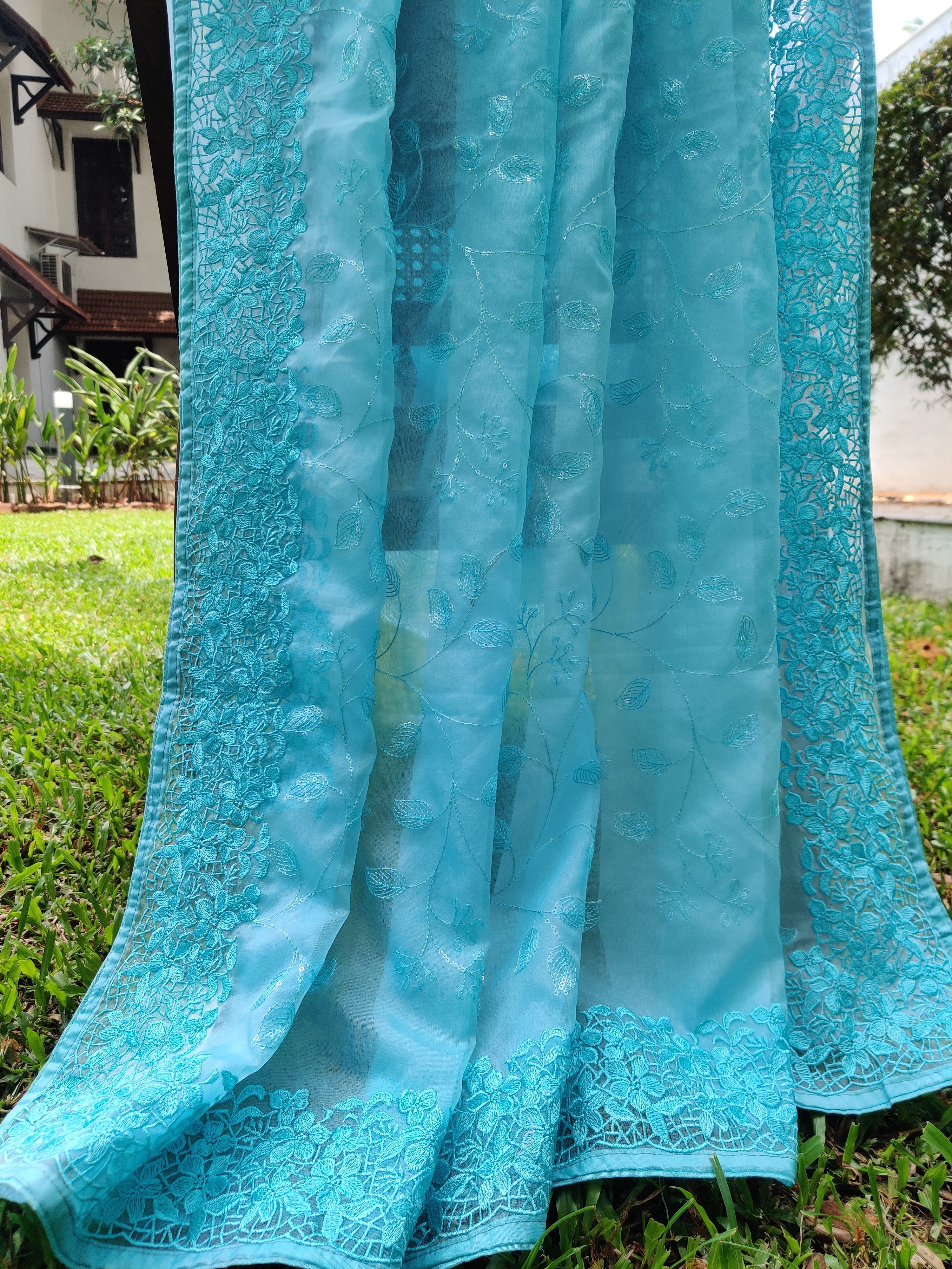 Blue Organza sari with Floral Design